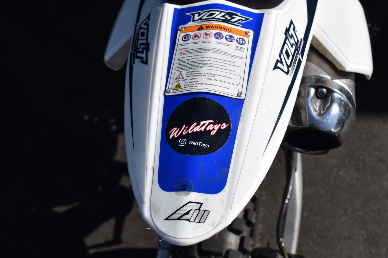 WILDTAYS logo sticker on a bike.